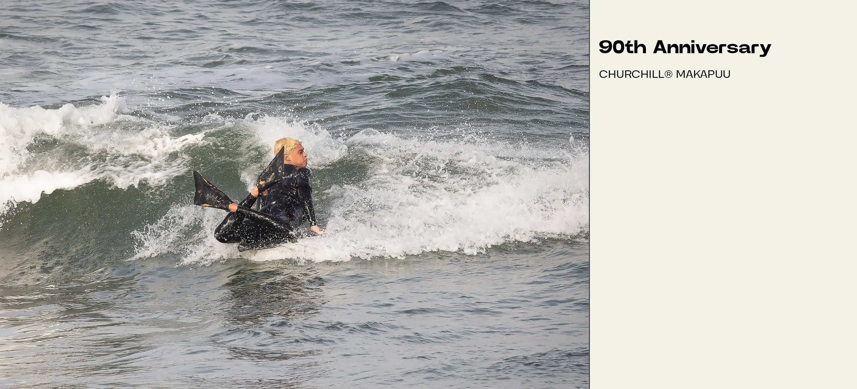 Rider on Churchill Makapuu bodyboard carving wave, 90th Anniversary edition